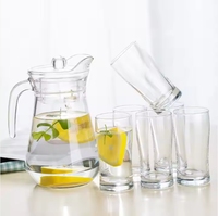 Vente en gros 1300ml/43.96oz Pichet en verre durable pour la maison Pichet d'eau potable au lait de style royal avec couvercle au design classique