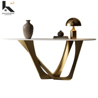 Console d'entrée de luxe avec plateau en pierre frittée et structure en acier inoxydable, table de canapé