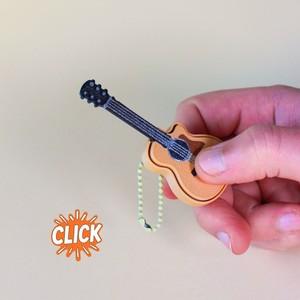 Nuevo llavero personalizado con forma de mini guitarra navideña impresa en 3D, juguete antiestrés. - Product Image 4