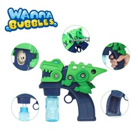 Wanna Bubbles, Pistola de Burbujas 2 en 1, de Plástico Desmontable, con Diseño de Dinosaurio de Dibujos Animados, Juguete