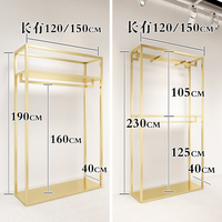 Portant à vêtements robuste en métal doré brillant en acier inoxydable pour boutique de vêtements sur mesure
