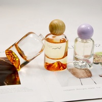 Desain baru disesuaikan parfum kaca kosong botol isi ulang dengan bentuk batu vulkanik bawah