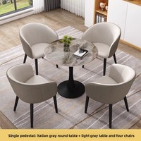 Ensemble de table à manger moderne en pierre frittée avec 4 chaises en cuir, style nordique de luxe léger, structure métallique, personnalisable pour restaurant commercial