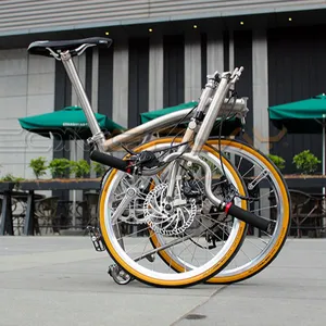 批发20英寸钛折叠自行车11速三折自行车钢叉盘式制动系统可折叠合金轮辋铝叉
