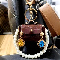 Porte-monnaie mini rétro de créateur, porte-clés créatif haut de gamme en cuir PU avec perles, cœur, goutte d'eau, strass et diamants