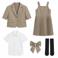 Ensemble uniforme scolaire kaki pour filles, blazer à manches courtes, chemise, nœud papillon, jupe plissée, style élégant et minimaliste pour enfants, OEM