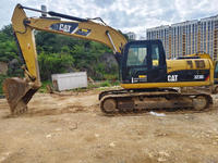 Excavatrice sur chenilles Caterpillar 323DL d'occasion à vendre, faible nombre d'heures, machine de construction