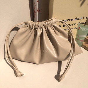 ODM/OEM High Quality Custom Emboss Logo PU Leathrt Drawstring Pouch Gift Makeup Packing Leather Dust Waterproof Pouch - Product Image 1