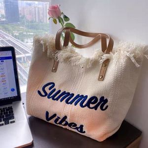 Sacs fourre-tout de plage pour femmes été 2025 avec broderie, réutilisables, écologiques, grande capacité, sac à main en toile avec pompon - Product Image 1