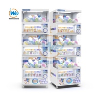 Máquina expendedora de cápsulas metálicas de triple plataforma Wangerbao Gachapon, oferta especial directa de fábrica, para juguetes de 100-120 mm