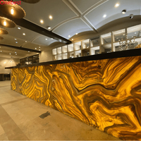 Comptoir de bar de luxe en marbre d'onyx led comptoirs de cuisine en pierre noire