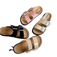 Sandales plates fiables pour femmes de marque chinoise avec fonction antidérapante Nouveau design Glissières à boucle en métal à double sangle Meilleur prix