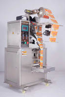 Machine d'emballage entièrement automatique multi-usages pour poudres et granulés avec fonctions d'enveloppement, de collage et d'étiquetage pour applications alimentaires