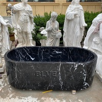 Baignoire autoportante en pierre naturelle de design italien moderne BLVE, baignoire de luxe en marbre noir pour la décoration de villas et d'hôtels