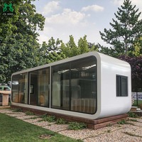 Maison préfabriquée en conteneur en acier contemporain Apple Capsule, structure en acier robuste, panneaux sandwich durables, design écologique pour