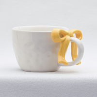 Ensemble tasse et soucoupe en céramique à motif de nœuds vibrants, peint à la main, pour café et lait