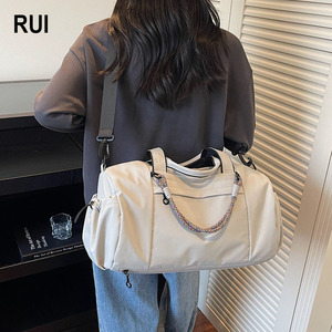 กระเป๋าคาดไหล่ RUIQUWIN สำหรับทุกเพศ แบบสปอร์ต เรียบง่าย สีพื้น ระบายอากาศได้ดี น้ำหนักเบา ทนทาน สายปรับได้ ขนาดใหญ่ - Product Image 1