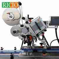 Machine d'étiquetage automatique RICIO pour films, cartons, bandeaux et surfaces planes, avec applicateur d'étiquettes autocollantes