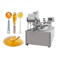 Machine de remplissage et de scellage de gobelets en plastique à tartiner le chocolat liquide rotatif automatique