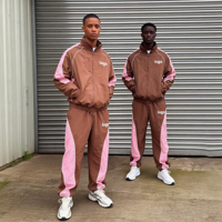 Ensemble de survêtement de sport personnalisé en deux pièces, style streetwear, en nylon avec piping réfléchissant, veste coupe-vent et pantalon de jogging