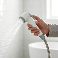 Pistolet de pulvérisation haute pression portable en ABS blanc, design ergonomique, pour bidet de toilette et robinet de salle de bain hygiénique