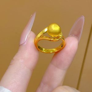 Bague élégante et raffinée dorée, style moyen-ancien, avec boule en fil torsadé, luxe léger et haut de gamme, pour petite amie - Product Image 1