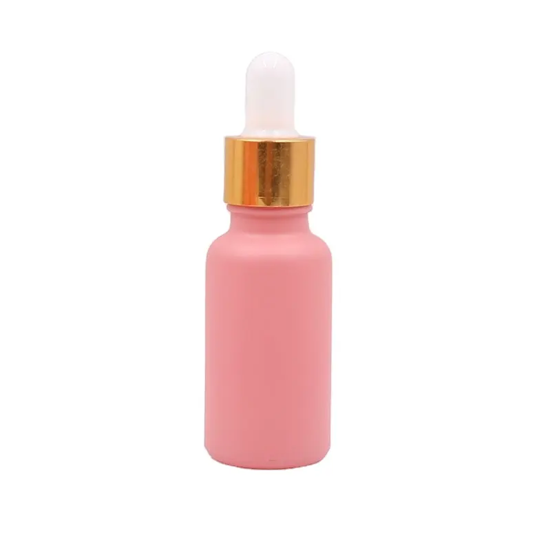 ขายร้อน 10ml 30ml สีชมพูของเหลวแก้วขวดน้ํามันหอมระเหยโลโก้ที่กําหนดเองขวดหยดเปล่า