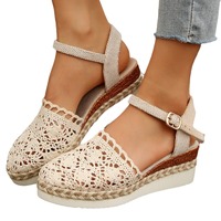 Sandales compensées tissées ajourées à talon ouvert, style pêcheur, très tendance