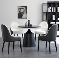 Mobilier moderne Table à manger ronde en acier inoxydable noir de luxe avec dessus en marbre blanc et noir pour la maison et le restaurant
