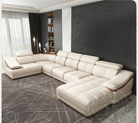 Sofa Seksional Kulit Asli Mewah Modern Eropa dengan Sandaran Kepala yang Dapat Disesuaikan dan Pengisi Daya