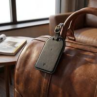 Traceur de bagages intelligent en cuir PU anti-perte avec fonction de localisation sonore, charge sans fil et compatible iOS pour une autonomie prolongée