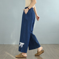Nouvelle collection Printemps-Automne 2026 : Jean large en denim grande taille pour femme, taille élastique, coupe courte, décontracté, couleur unie, ourlet fendu, nœud en dentelle