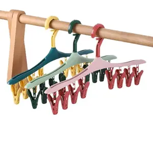 1PC Tendedero Multifuncional Resistente al Viento con 8 Pinzas, Ideal para Ropa, Ropa Interior y Calcetines, Colgador de Plástico Vibrante en Colores Caramelo - Product Image 1