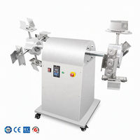 Machine automatique de moulage de chocolat en acier inoxydable pour la fusion, le tempérage, l'enrobage et le refroidissement, avec équipement de balancement pour billes d'œufs creuses
