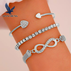 طقم أساور نسائية مكون من 3 قطع مطلية بالذهب مع زركون على شكل رقم 8 قابل للتعديل - Product Image 2