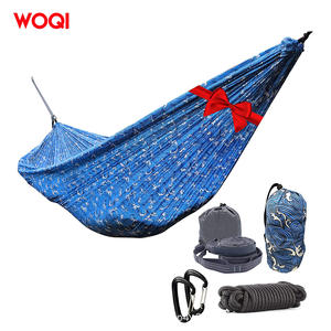 Hamac de camping Woqi en nylon, capacité de charge 226 kg, lit suspendu portable pour extérieur avec mousquetons pour la randonnée et le trekking - Product Image 1