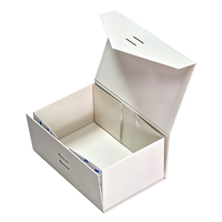 Boîte cadeau magnétique pliable haut de gamme blanche, gain de place, finition mate, ruban offert, conception personnalisable, emballage plat, pliable, directement de l'usine