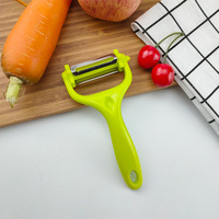 Multifunctionele plastic PP groente- en fruit schiller met scherp mes, antiaanbaklaag, makkelijk schoon te maken, duurzaam keukengereedschap