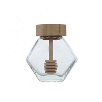 Tarro de miel único con cuchara de madera, tarro de vidrio hexagonal al por mayor para miel
