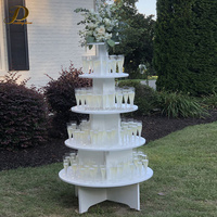 JINDA Nouveau support de présentation pour flûtes à champagne en PVC blanc rond à 4 niveaux, support pour verres à cocktail pour mariage, fête, décoration d'événements