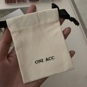 Custom Wholesale Small Cotton Packaging <b>Bag</b> Natural Color Cotton <b>Dust</b> Pouch With Black Ribbon - Product Image 1