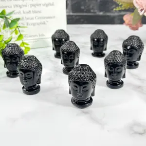 Venta al por mayor cristal natural negro obsidiana tallas piedras preciosas obsidiana cabeza de Buda artesanías para regalos y decoración