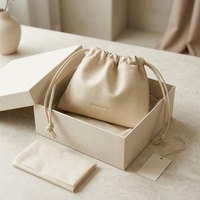 Pochette à cordon en cuir PU grainé crème, sac de rangement pour bijoux et cadeaux, organisateur de voyage pour cosmétiques, emballage personnalisé avec logo, vente en gros