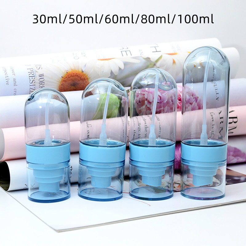 white cosmetic spray bottle