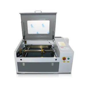 China fábrica artesanato pequenos copos de couro acrílico de madeira co2 laser máquina de corte 4040 com controle m2 e passagem