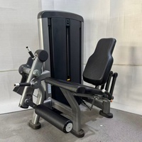 Appareil de musculation commercial à charge par poulie pour extension des jambes assise