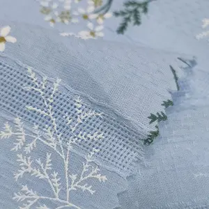 Tela China de alta calidad para vestido de mujer, tela blanca bordada con ojal de gasa suiza, tela bordada 100% de algodón - Product Image 1