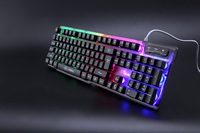 La nouvelle combinaison de clavier et de souris LED colorées filaire USB 104 touches clavier ergonomique ensemble de souris convient aux joueurs