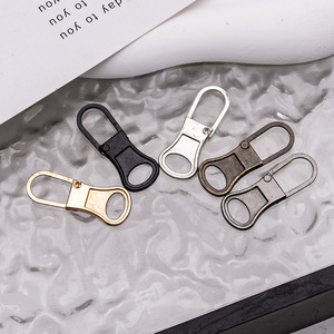 Detachable <b>zipper</b> pulls for bags, coats, clothes, shoes, boots, and <b>replaceable</b> <b>zipper</b> charms without tools. - Product Image 1
