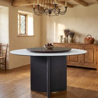 Table à manger ronde moderne de luxe pour les réunions de famille, avec plateau en marbre et base sur piédestal
